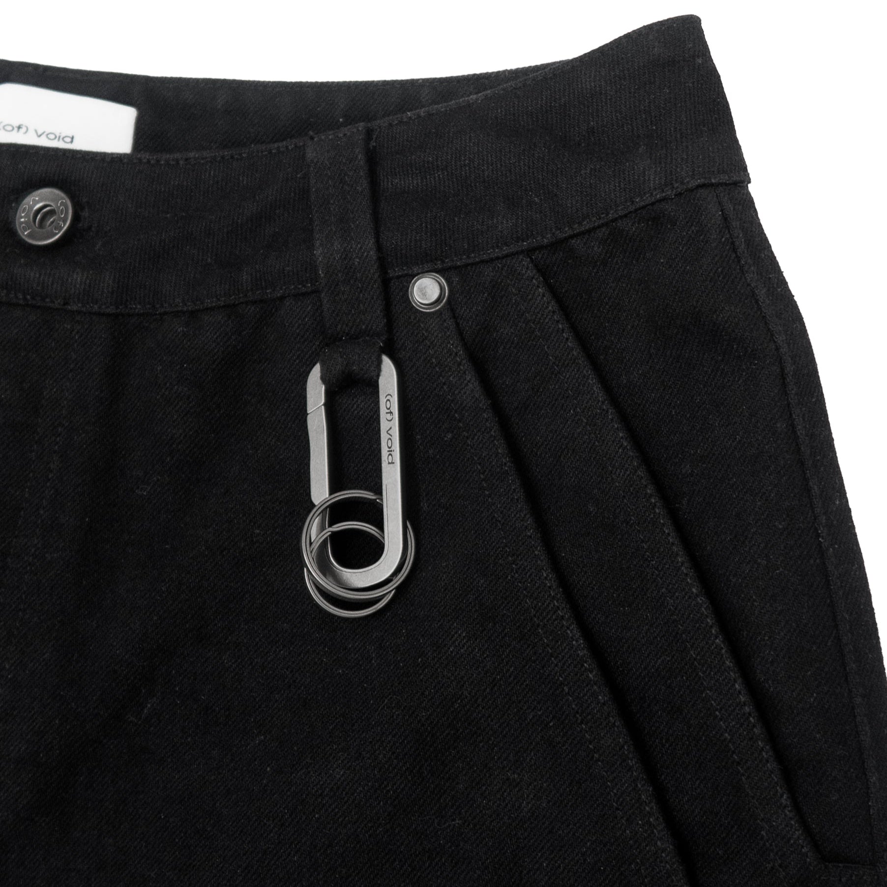 (of) void titanium carabiner on denim
