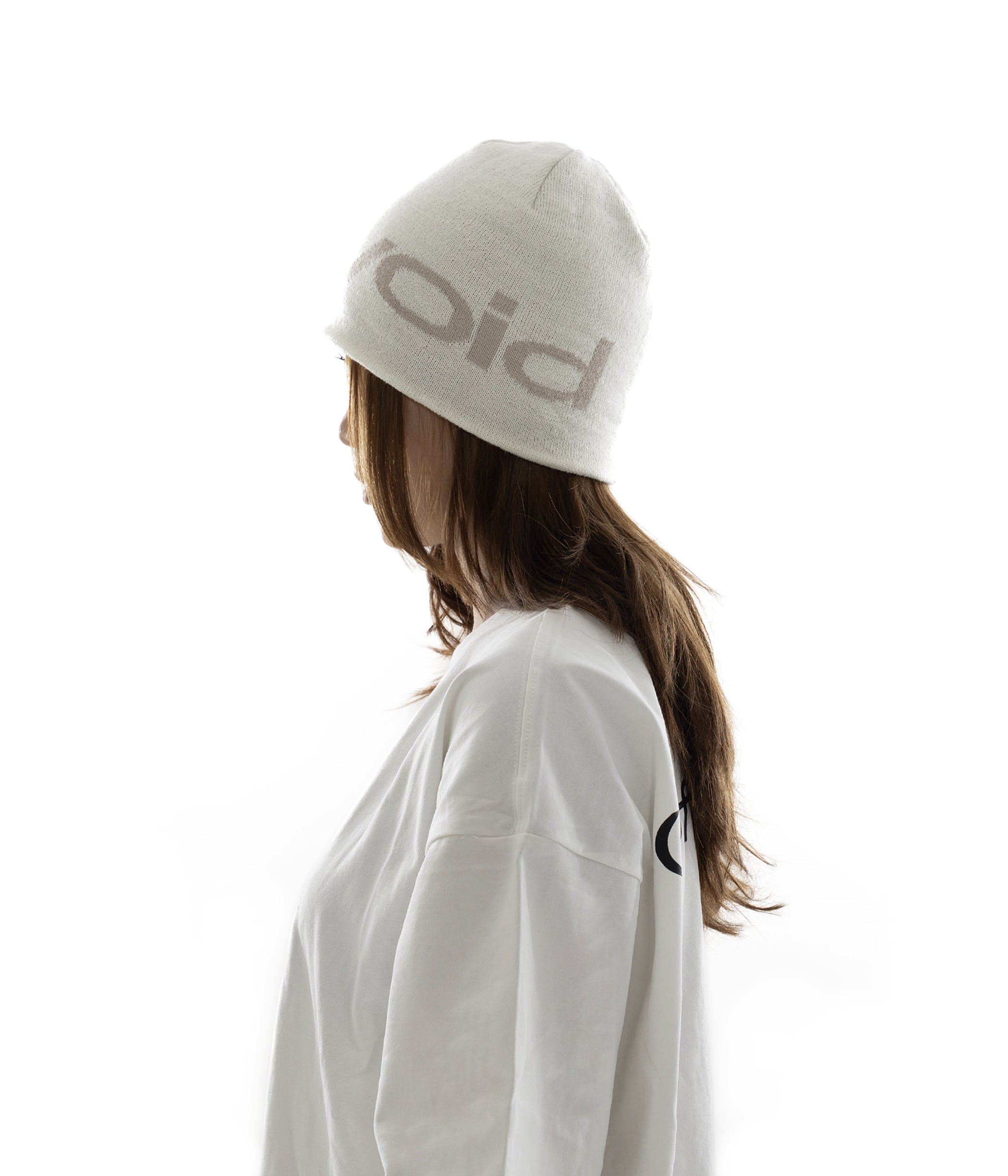 (of) void jacquard logo beanie in white side view on female model